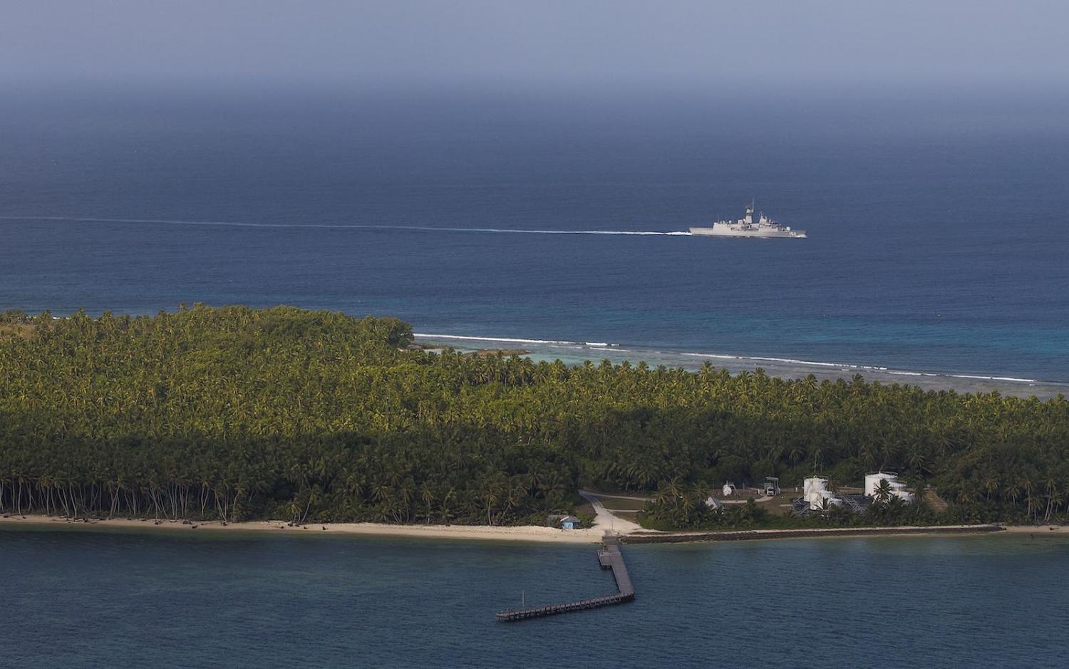 HMAS Warramunga sails past the Cocos (Keeling) Islands in the Indian Ocean (Defence Department)