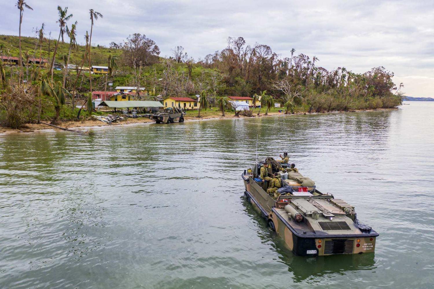 Australian soldiers land on the island of Galoa, near Vanua Levu, in Fiji to drop off supplies required to repair buildings affected by Cyclone Yasa in December 2020 (Department of Defence)