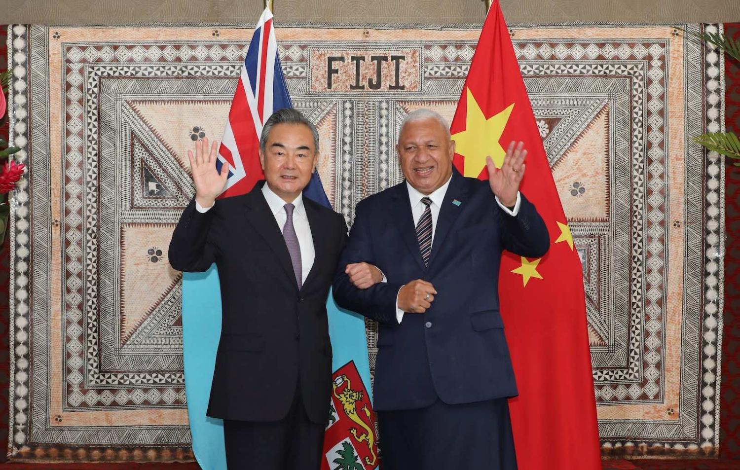 China’s Foreign Minister Wang Yi in Suva last mont with Fiji’s Prime Minister Voreqe “Frank” Bainimarama (Zhang Yongxing/Xinhua via Getty Images)