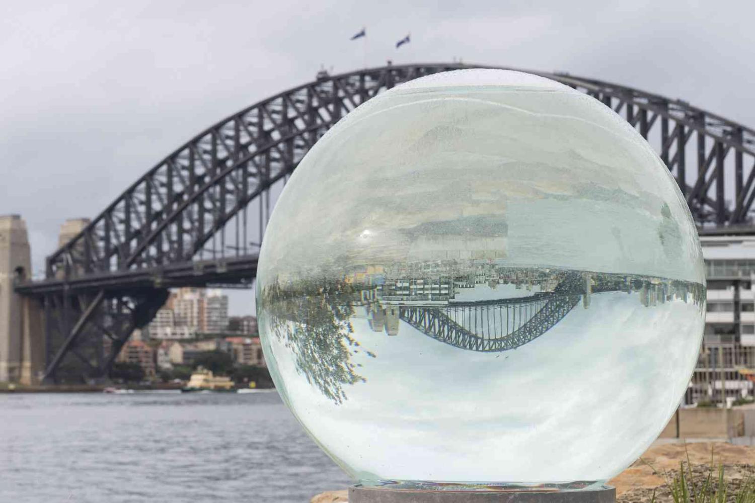 The Sydney Harbour Bridge transforms upside down in artist Lucy Humphrey’s “Horizon” (James D. Morgan/Getty Images)