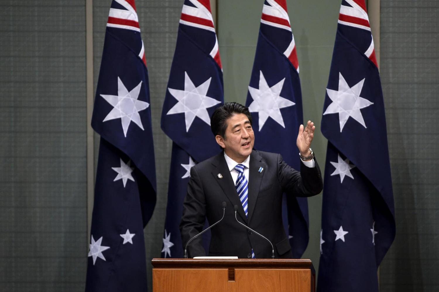 Shinzo Abe was a crucial player in the extraordinarily close bilateral relationship between Australia and Japan (Lukas Coch/Pool/Getty Images)