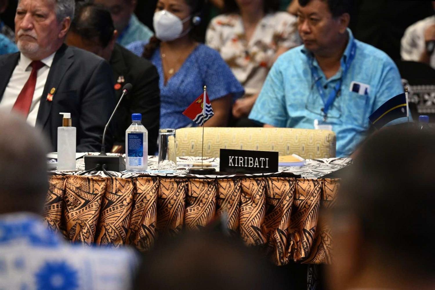 Kiribati’s seat sits empty as Pacific Island leaders listen to the opening remarks of Pacific Islands Forum in Suva on 12 July (William West/AFP via Getty Images)