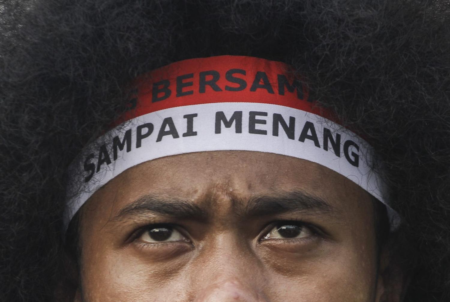 Protesters rally outside the Indonesian parliament building in June to demonstrate against the draft criminal code (Eko Siswono Toyudho/Anadolu Agency via Getty Images)