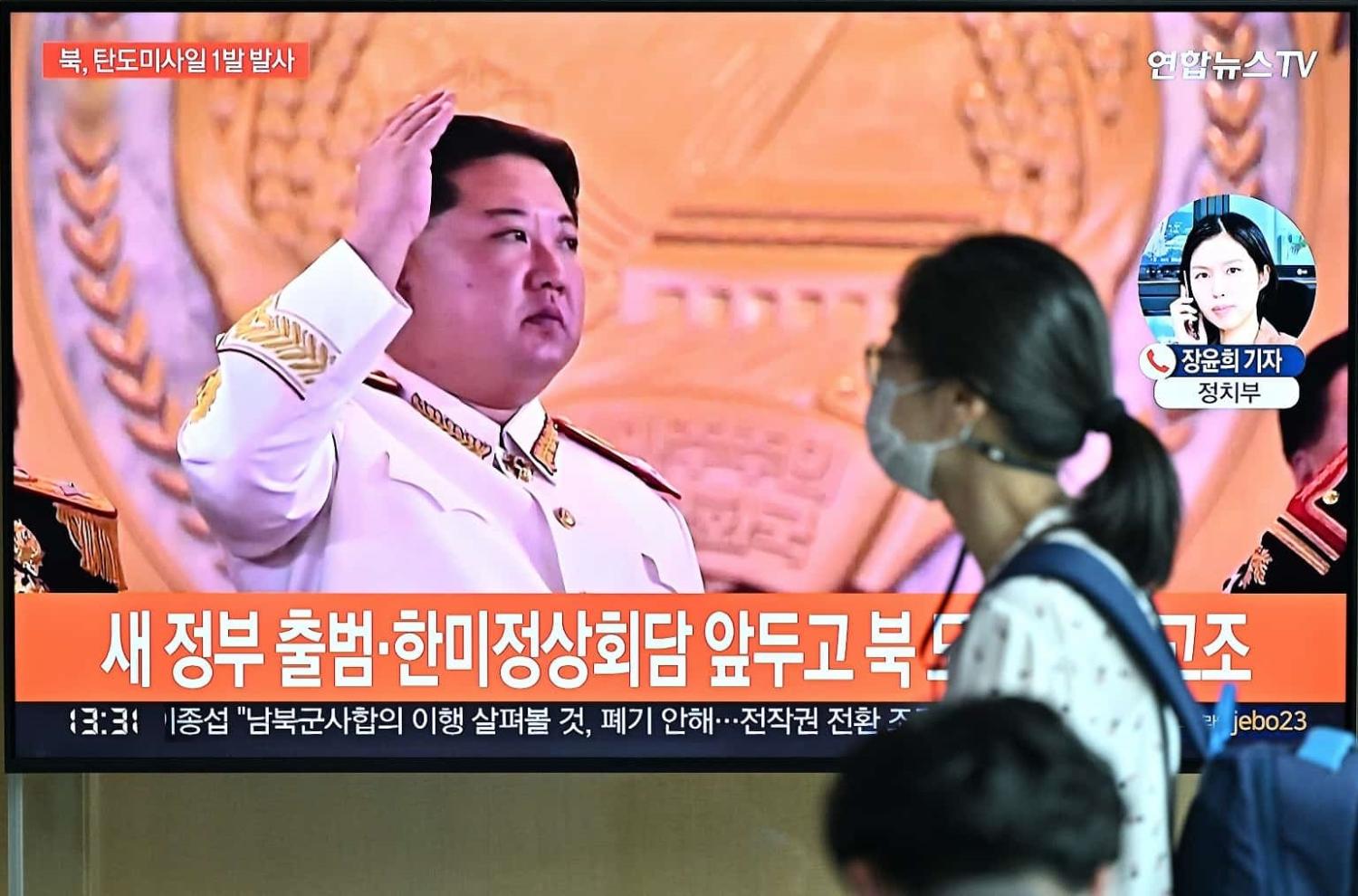 TV news in North Korea reports the firing of a ballistic missile on 4 May 2022 (Jung Yeon-je/AFP via Getty Images)