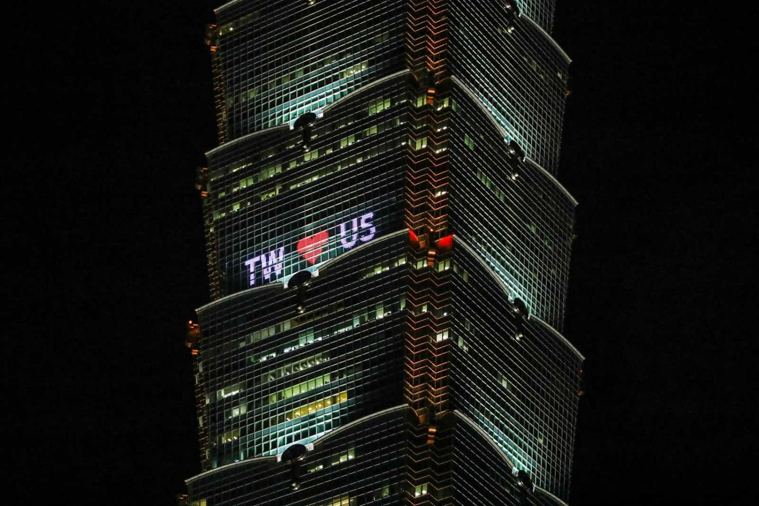 The Taipei 101 building lit up with a message reading "TW hearts US" before the impending visit of US House Speaker Nancy Pelosi, 2 August 2022 (I-Hwa Cheng/Bloomberg via Getty Images)