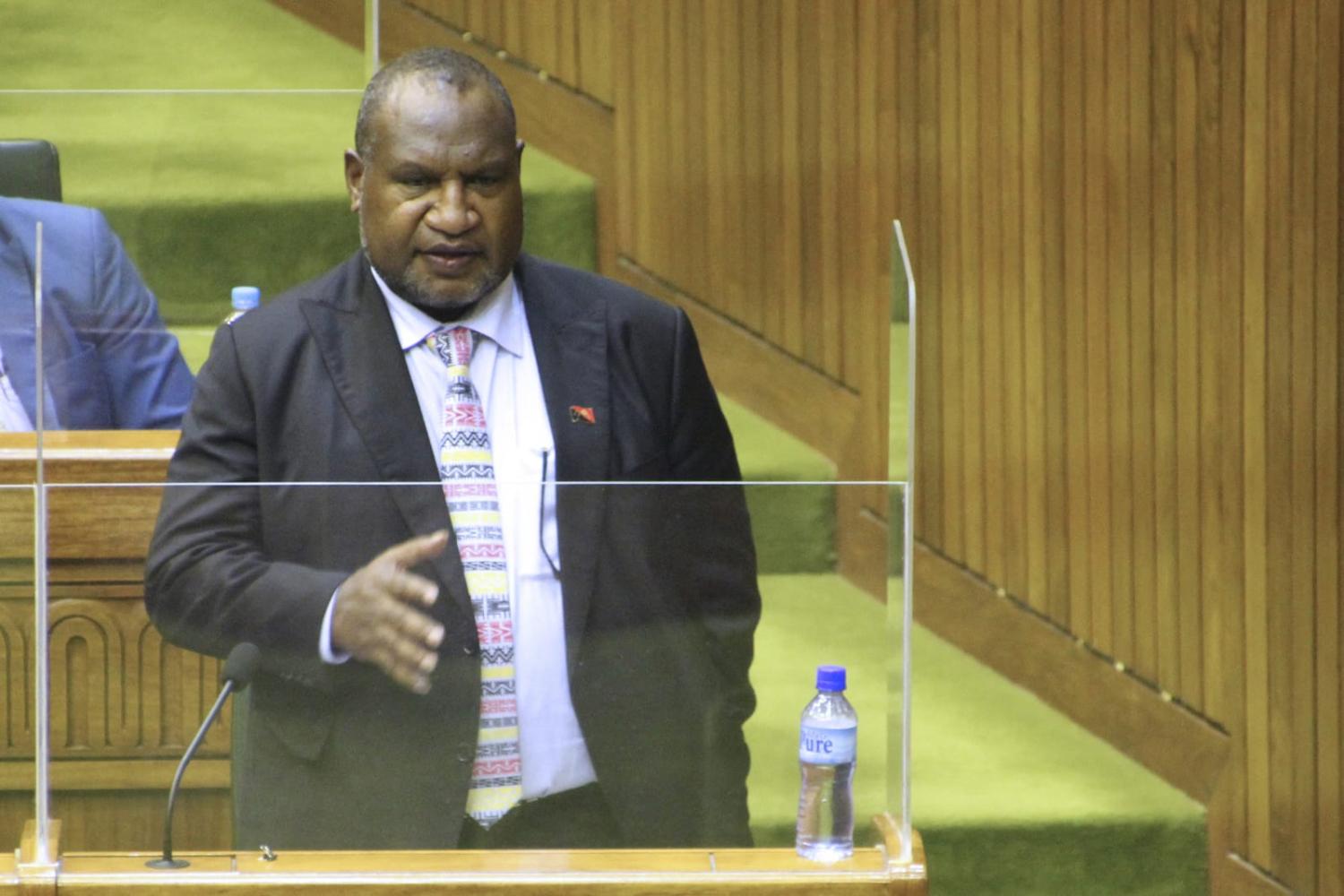 Papua New Guinea’s Prime Minister James Marape speaks in parliament after he was sworn in for his second term as prime minister in Port Moresby on 9 August (Andrew Kutan/AFP via Getty Images)