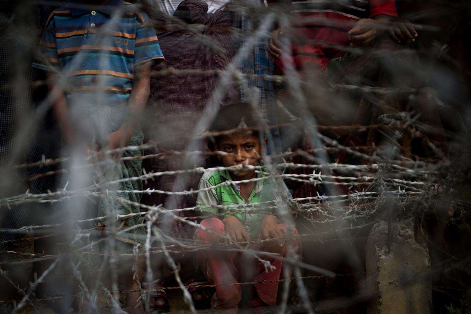 Rohingya refugees gather in “No Man's Land” on the Myanmar–Bangladesh border (Ye Aung Thu/AFP via Getty Images)