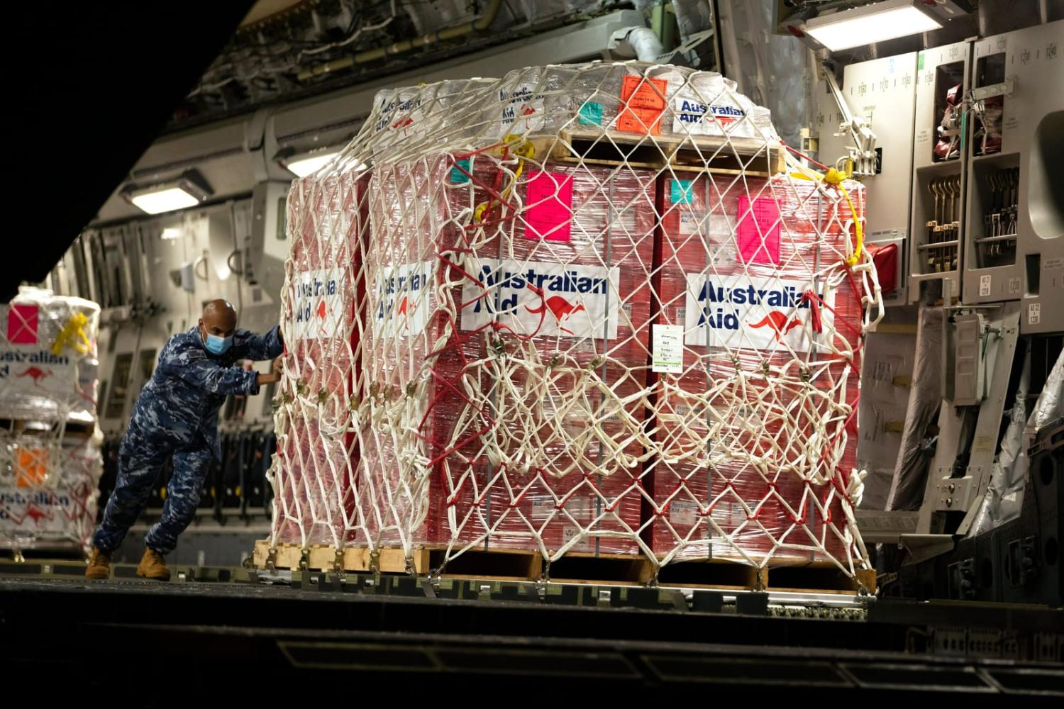 Unloading humanitarian aid and disaster relief stores at Nadi International Airport in Fiji in July (Defence Department)