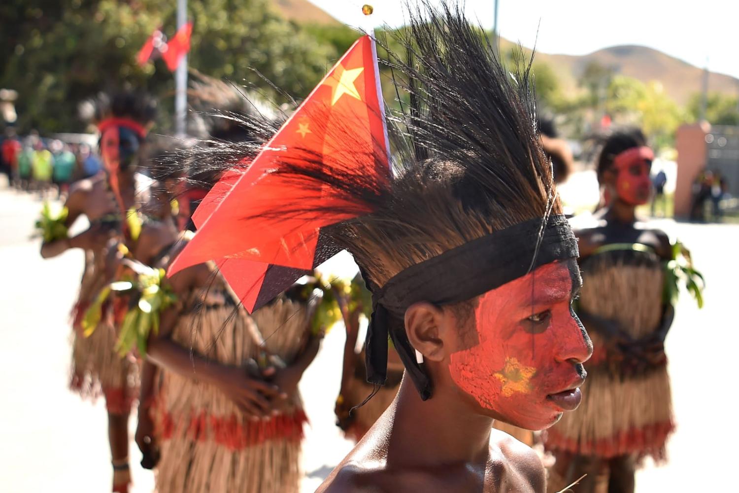 Performers arrive ahead of a visit by China's President Xi Jinping to the Butuka Academy school in Port Moresby during the 2018 APEC summit (Peter Parks/AFP via Getty Images)