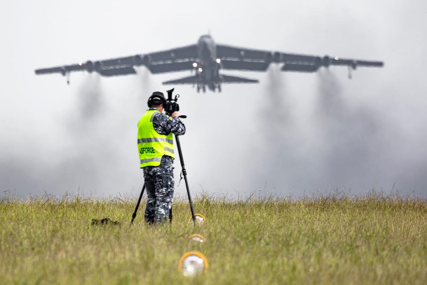 Photographing the take-off of a United States Air Force B-52 Bomber from RAAF Base Darwin during Exercise Diamond Storm in 2019 (Defence Department)