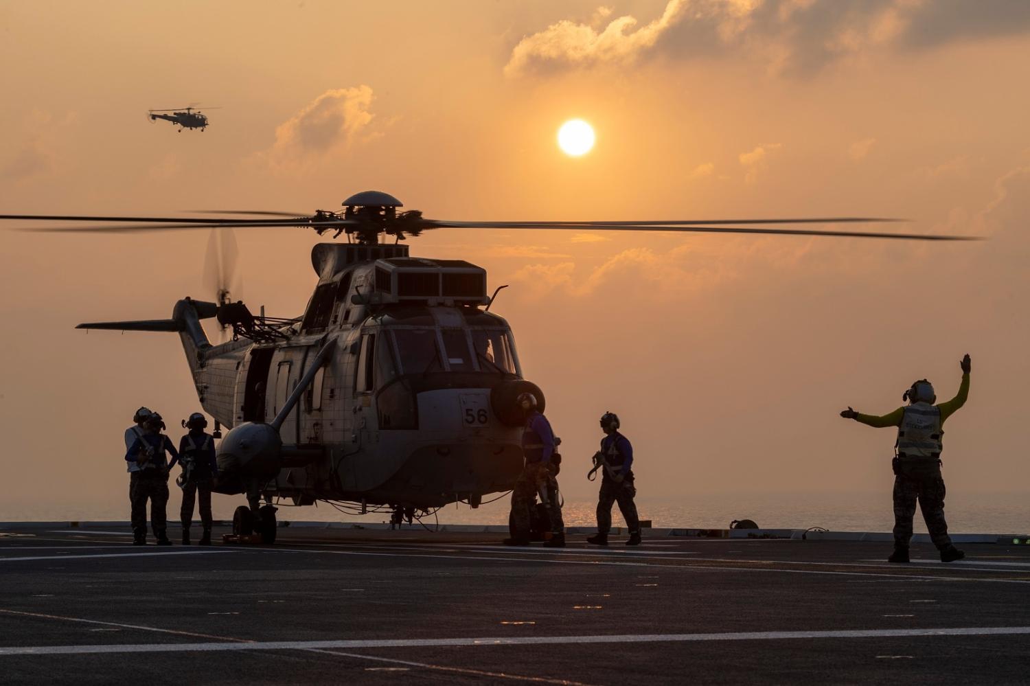 An Indian Navy UH-3H Sea King helicopter prepares to launch from HMAS Adelaide during Indo-Pacific Endeavour 2022 (Sittichai Sakonpoonpol/Defence Images)