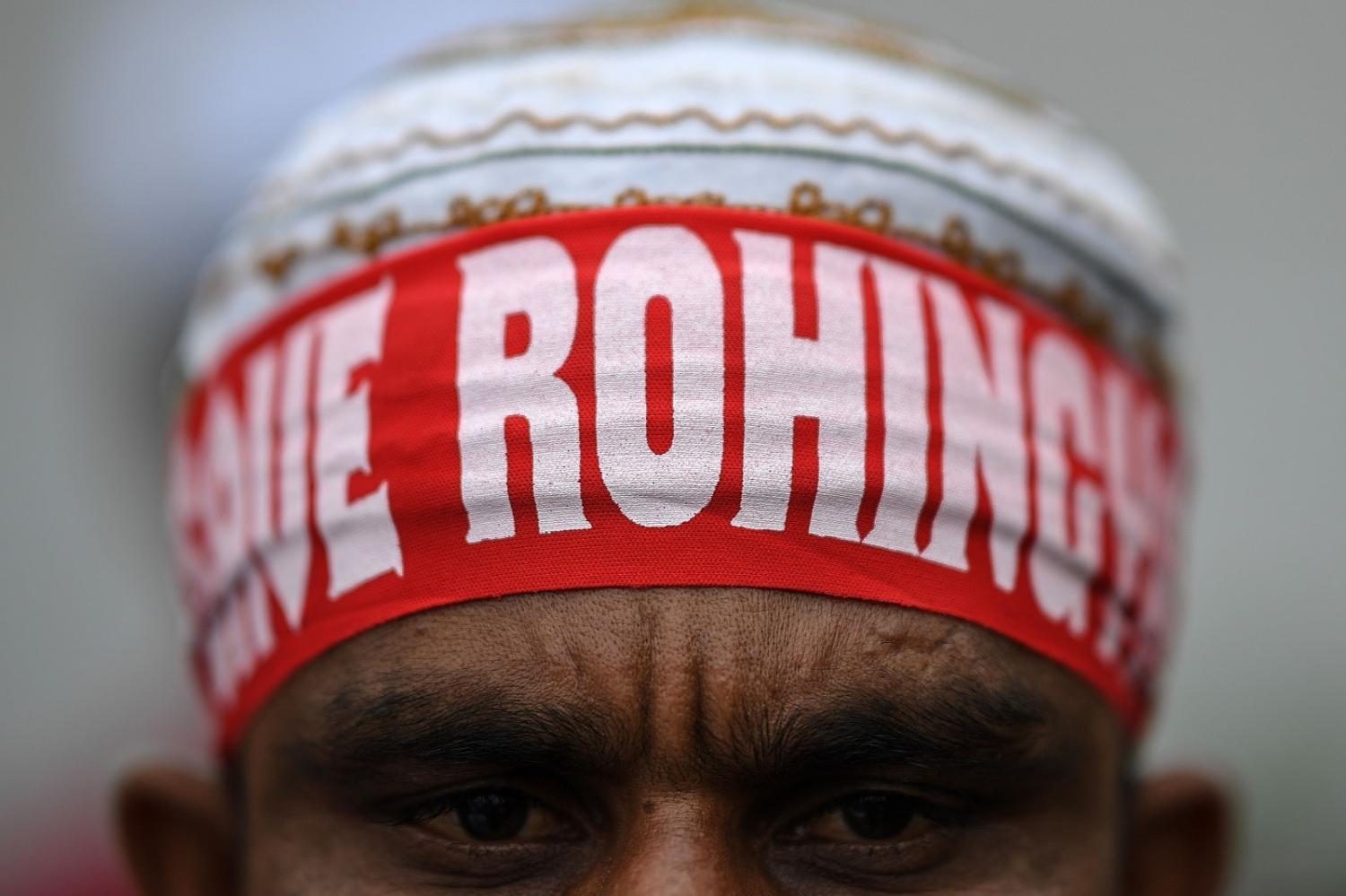 A Rohingya refugee living in Malaysia wears a headband reading "Save Rohingya" during a protest in Kuala Lumpur in 2017 (Mohd Rasfan/AFP via Getty Images)