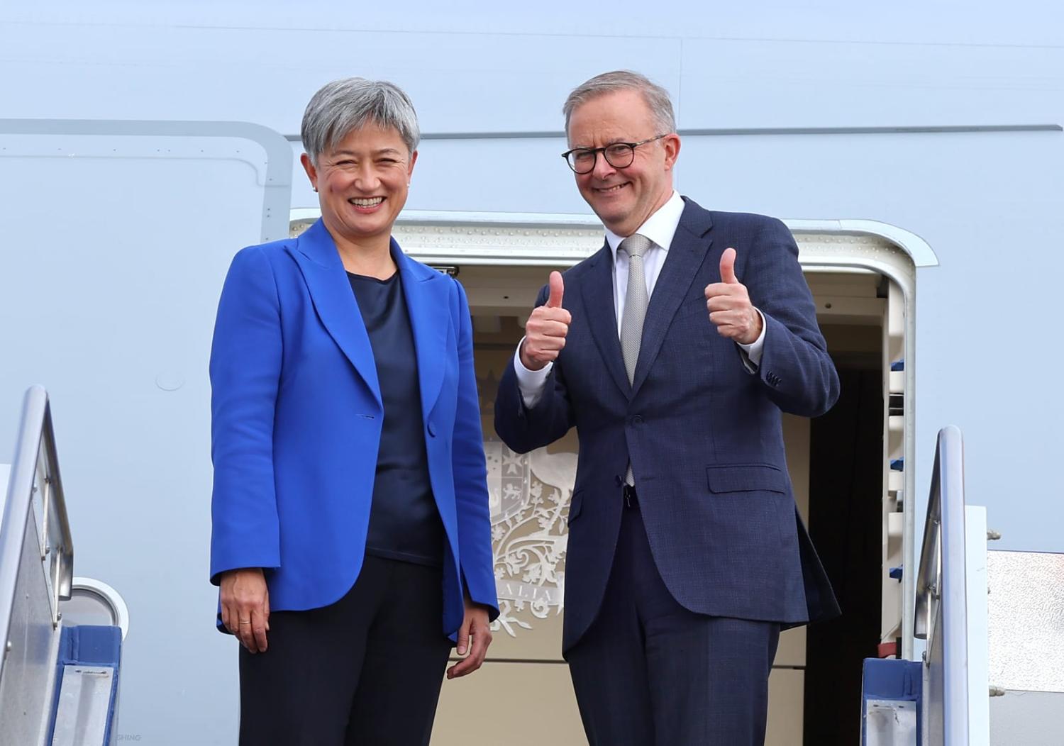 New team: Prime Minister Anthony Albanese (right) with Foreign Minister Penny Wong bound for Tokyo after being sworn in (David Gray/Getty Images)