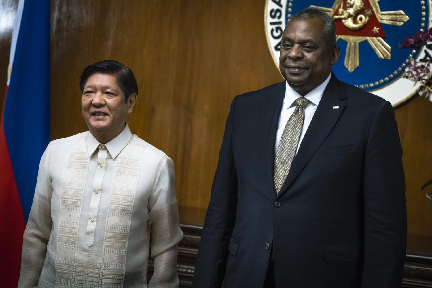 US Secretary of Defence Lloyd Austin (right) greets Philippine President Ferdinand "Bongbong" Marcos this month in Manila (SecDef/Flickr)