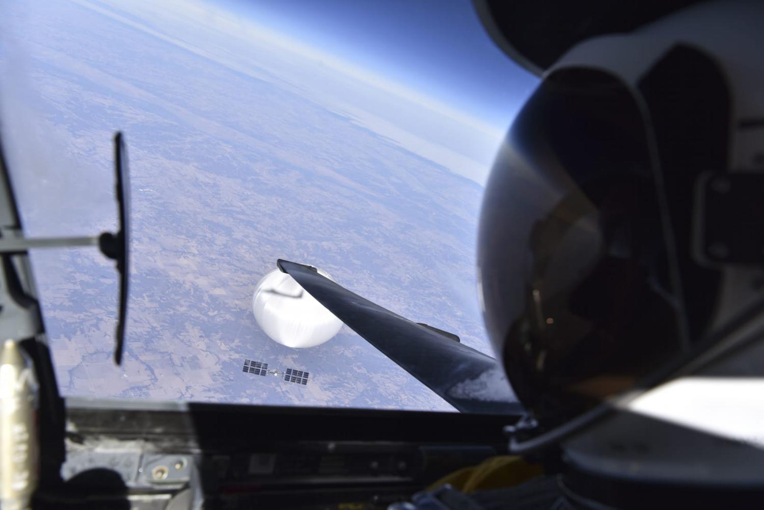 A US Air Force pilot looks down at a suspected Chinese surveillance balloon as it hovered over the central continental United States on 3 February (US Department of Defence via Getty Images)