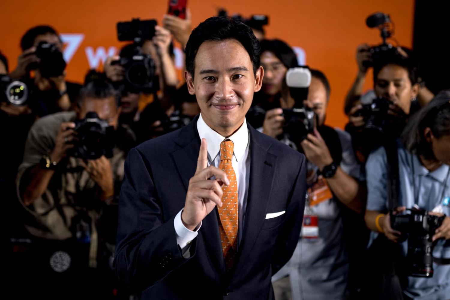 Move Forward Party leader and prime ministerial candidate Pita Limjaroenrat poses for media following a press conference at the party headquarters in Bangkok on 15 May (Jack Taylor/AFP via Getty Images)