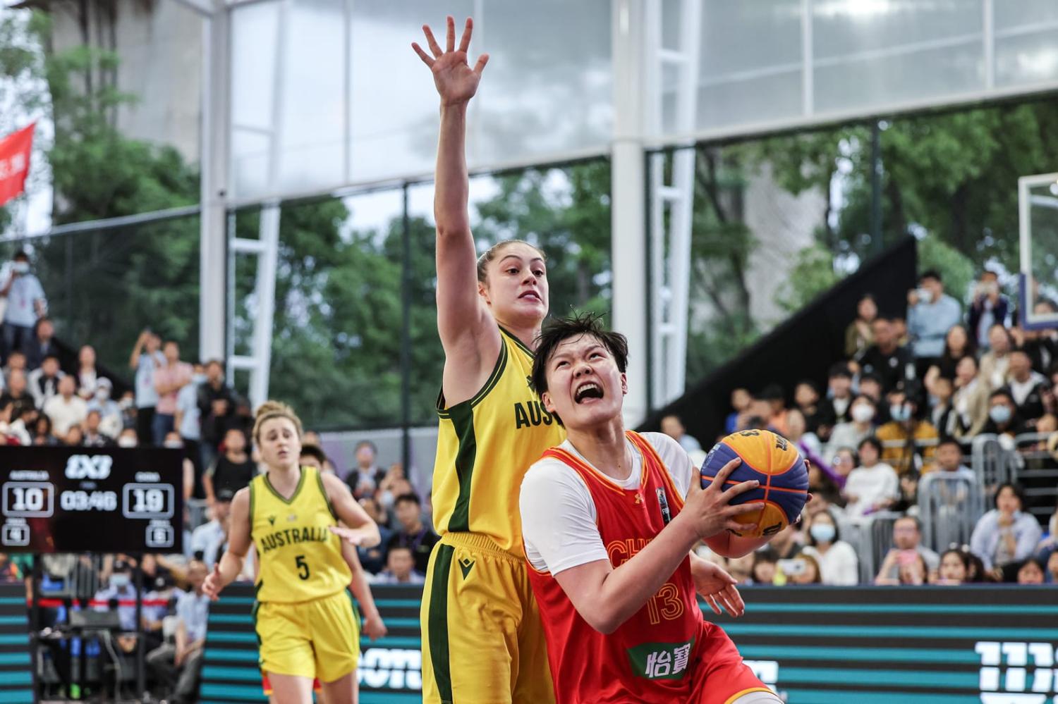 Wan Jiyuan of China and Australia’s Chloe Louise Bibby in action during the 7 May game between China and Australia at Wuhan Jiangxia Shengfan Sports Park, Wuhan, China (Wang He/Getty Images)