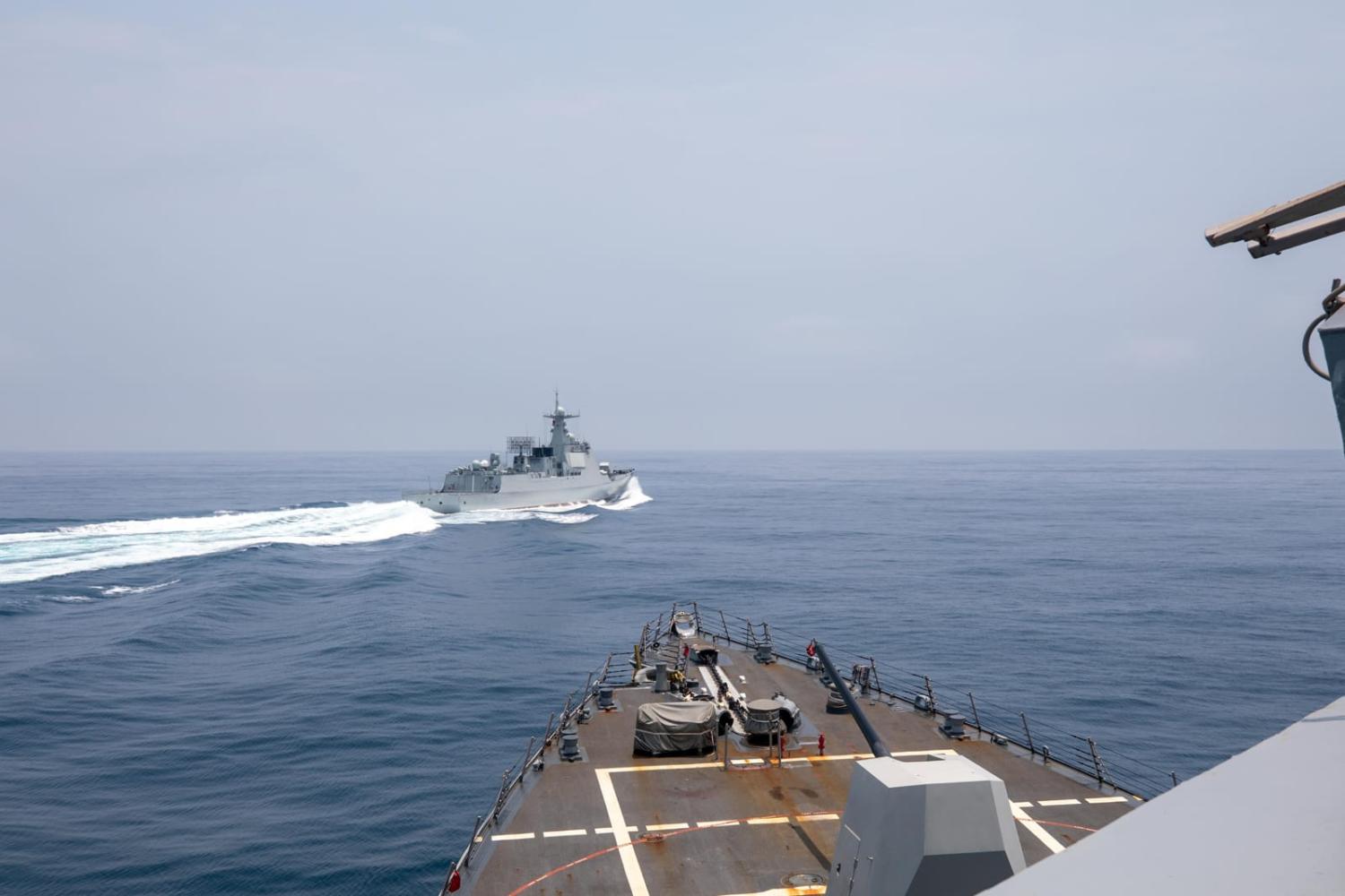 A photo released by the US Navy from the deck of USS Chung-Hoon as PLA-N LY 132 cuts across the bow in the Taiwan Strait (Andre T. Richard/US Navy)
