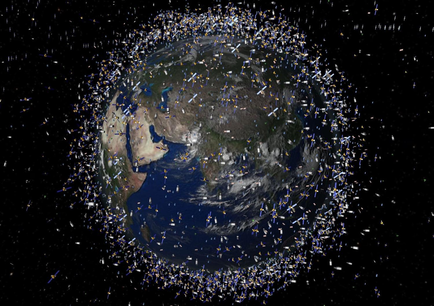 This computer-generated image shows some of the 11,500 trackable objects in low Earth Orbit where there are many commercial, military, scientific and navigational satellites (ESA/AFP via Getty Images)
