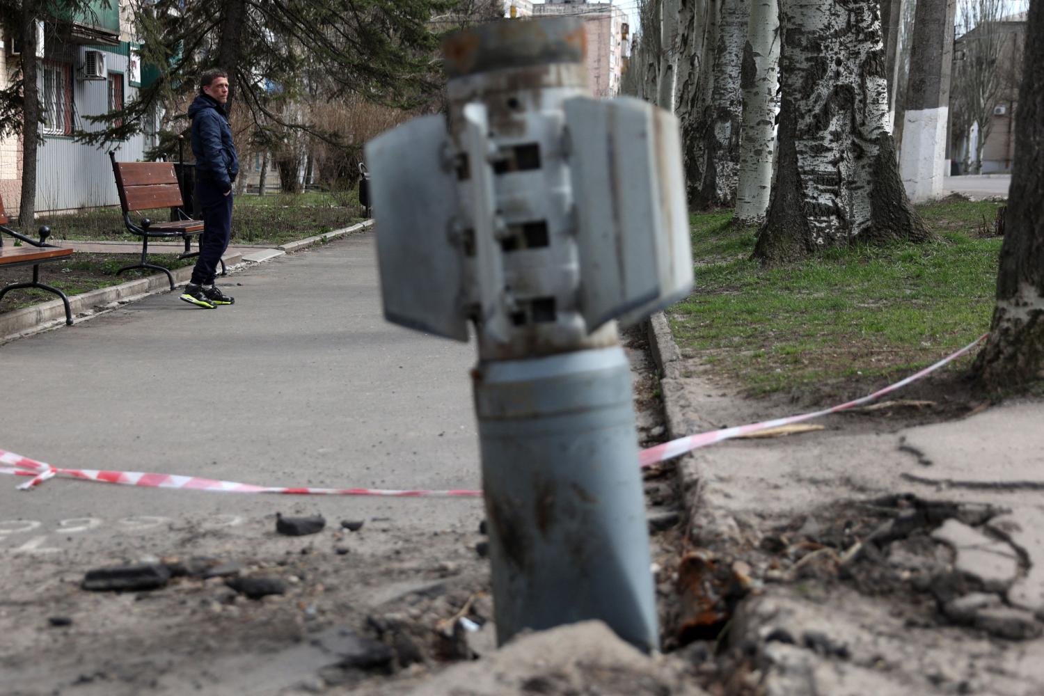 The unexploded tail section of a 300mm rocket which appeared to contain cluster bombs after shelling in Lysychansk, Ukraine, in April (Anatolii Stepanov/AFP via Getty Images)