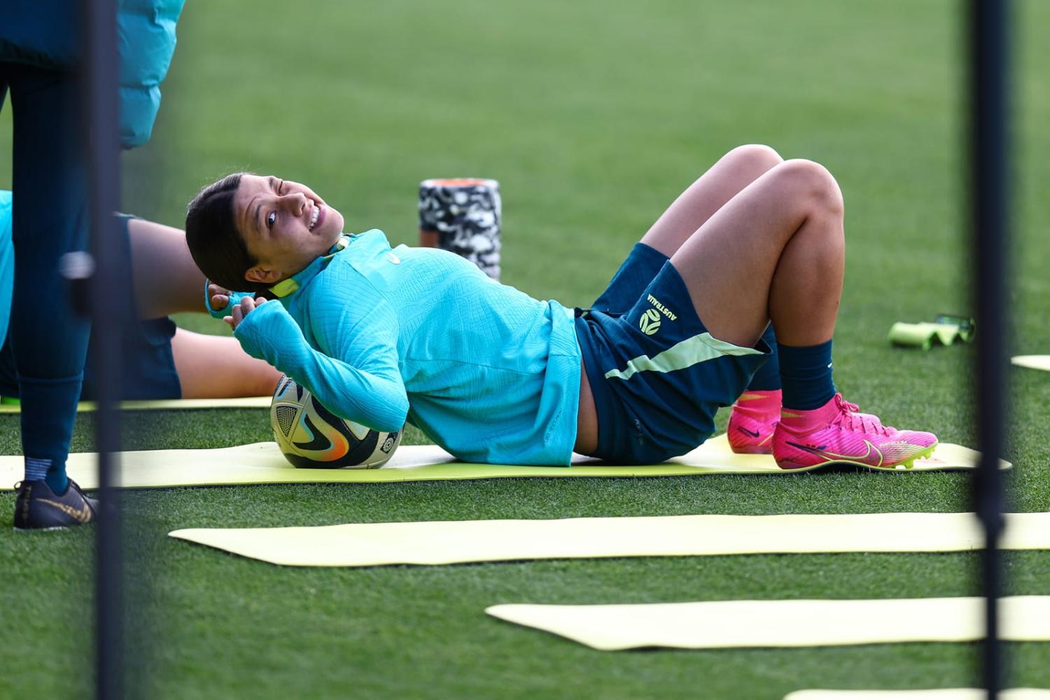 Sam Kerr stretches during an Australian Matildas training session in Sydney ahead of the FIFA Women's World Cup semi-final against England on Wednesday (Charlotte Wilson/Offside via Getty Images)