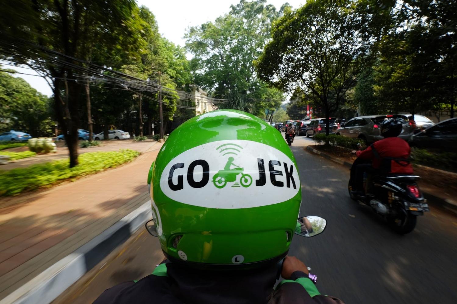 Gojek ride-share service provides transportation, courier, food delivery and shopping services in Indonesia (Dimas Ardian/Bloomberg via Getty Images)