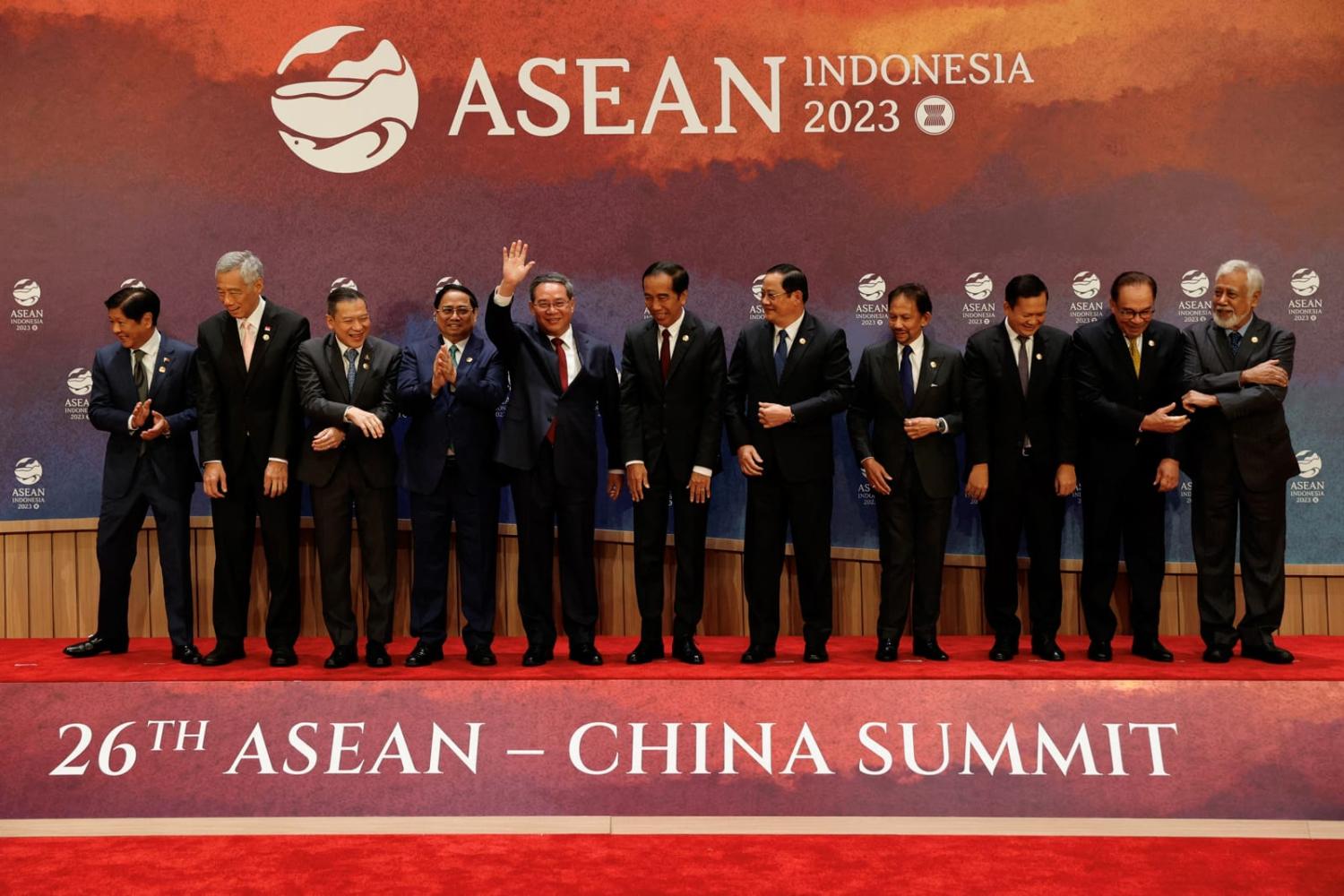 China's Premier Li Qiang waves amid the assembled ASEAN leaders following the ASEAN-China Summit, 6 September 2023 (Willy Kurniawan, Mast Irham via AFP/Getty Images)