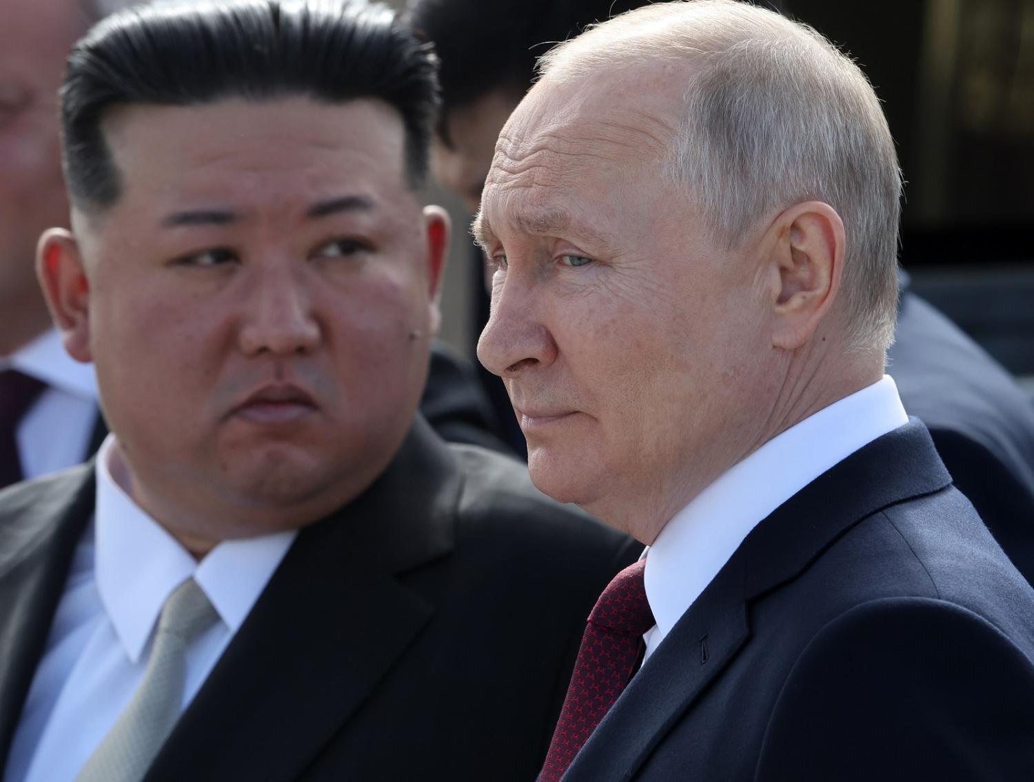 North Korean leader Kim Jong-un (L) and Russian President Vladimir Putin visit the construction site for the Angara rocket launch complex on 13 September in Tsiolkovsky, Russia (Getty Images)
