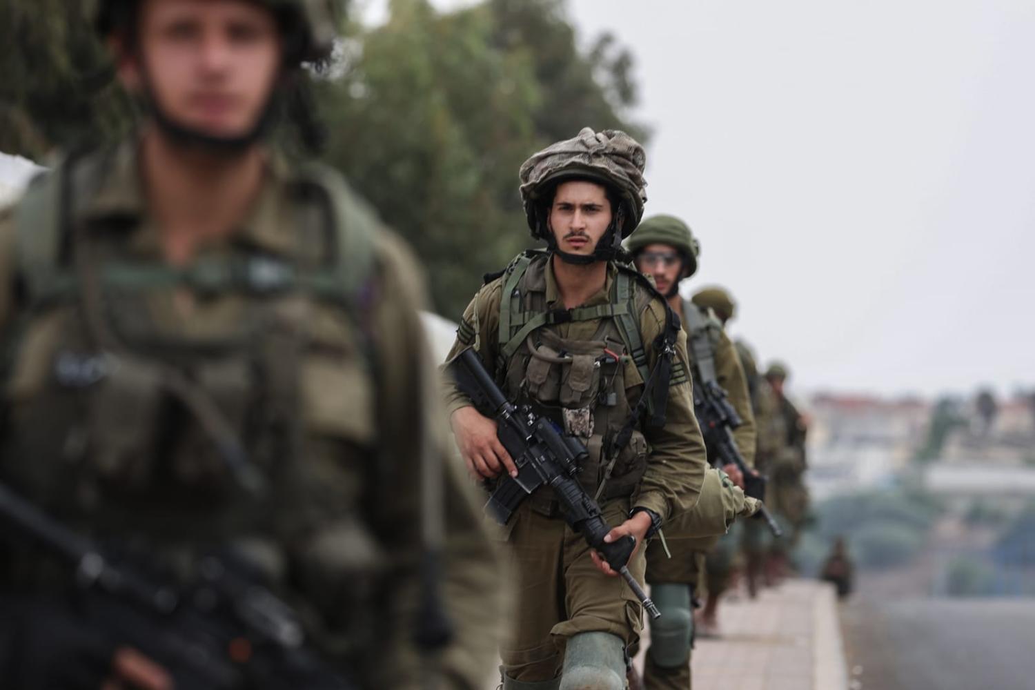Israeli soldiers patrol in Sderot on 11 October in the days after a Hamas incursion from Gaza (Ilia Yefimovich via Getty Images)