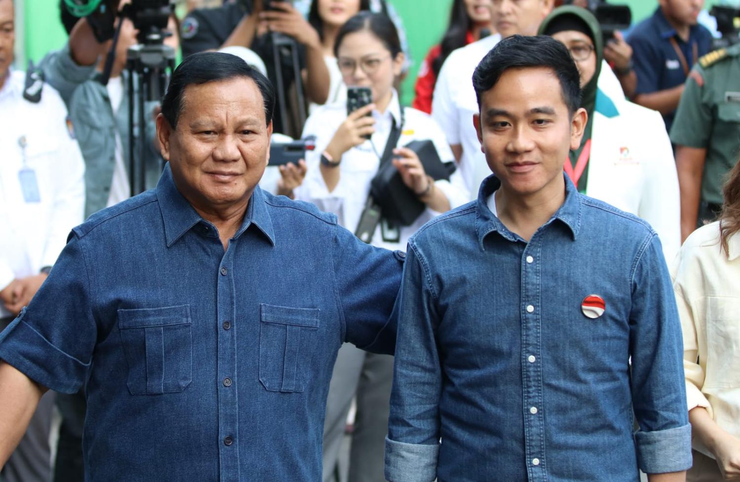 Presidential candidate Prabowo Subianto, left, and vice-presidential candidate Gibran Rakabuming Raka, son of President Joko Widodo, after announcing they are running mates in elections next year (AFP via Getty Images)