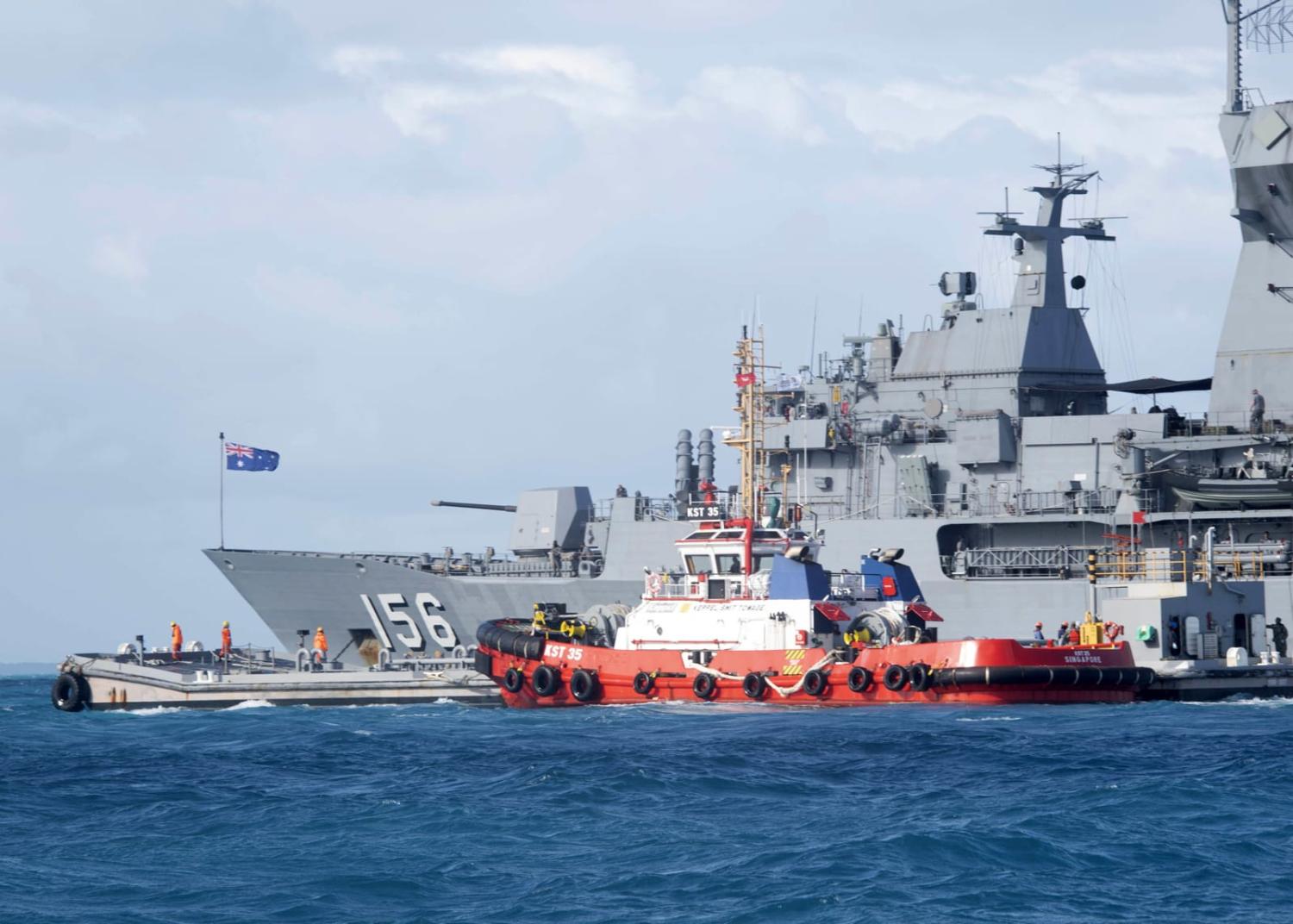 HMAS Toowoomba anchoring to refuel at the US base on Diego Garcia in June 2020 (Carlos W. Hopper/US Navy)