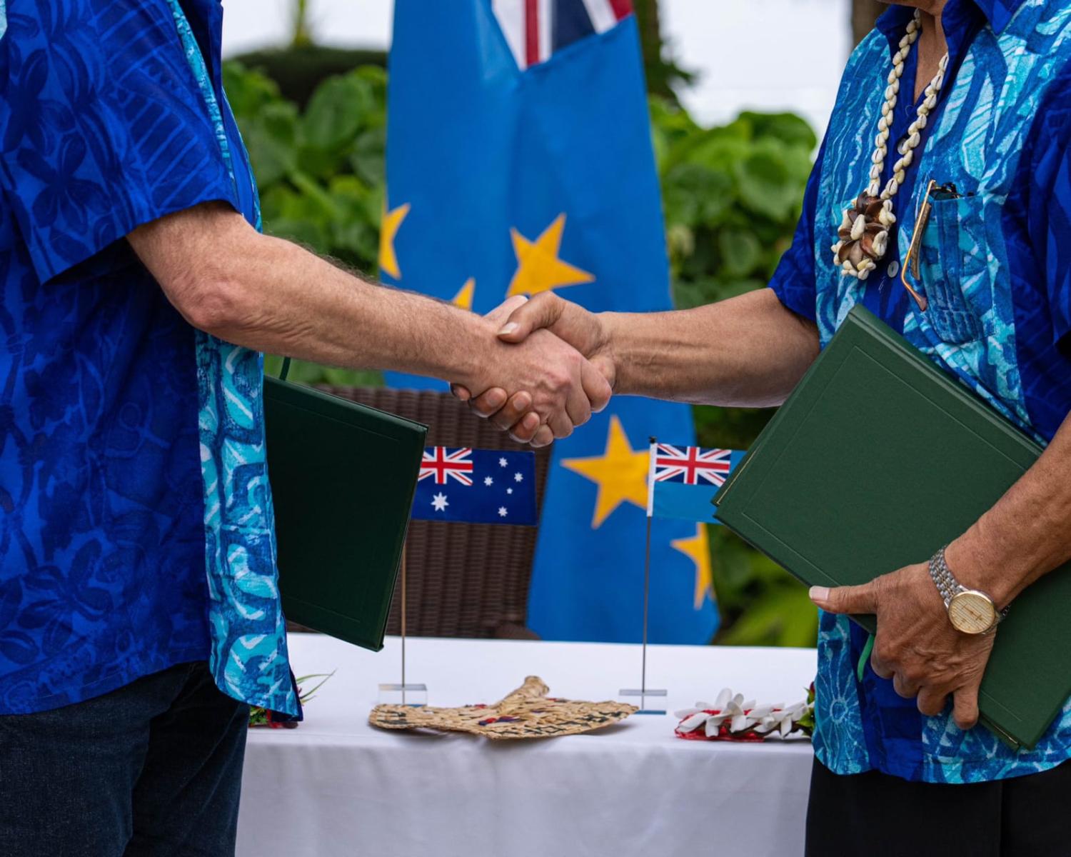 Australia's Prime Minister Anthony Albanese shakes hands with Tuvalu's Prime Minister Kausea Natano after signing the “Falepili Union” on 10 November (AlboMP/X)