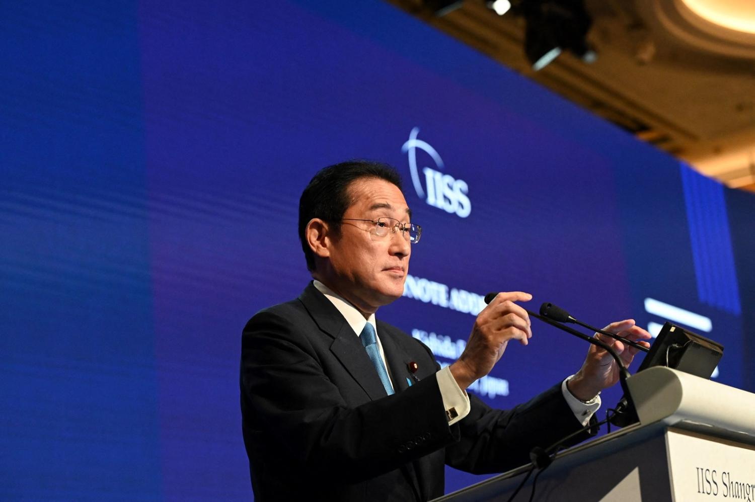 Japan's Prime Minister Fumio Kishida delivers a keynote address at the Shangri-La Dialogue summit in Singapore on 10 June 2022 (Roslan Rahman/AFP via Getty Images)