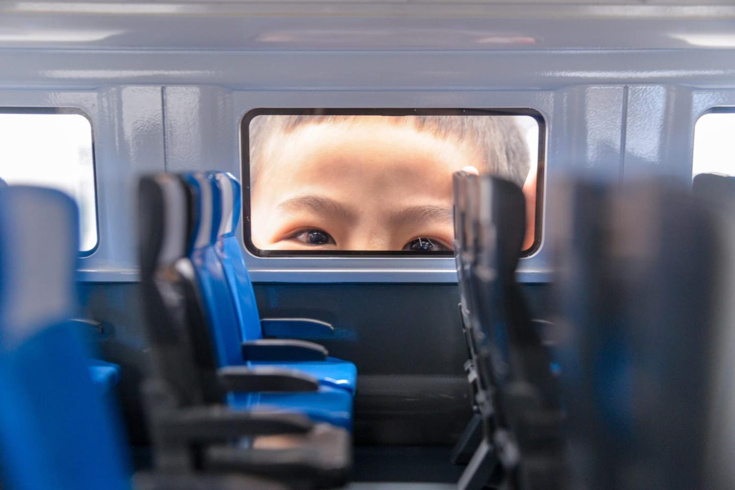 A child looks inside the model of a high-speed train of the Jakarta-Bandung High-Speed Railway at Halim Station in Jakarta, Indonesia, 5 November (Xu Qin/Xinhua via Getty Images)