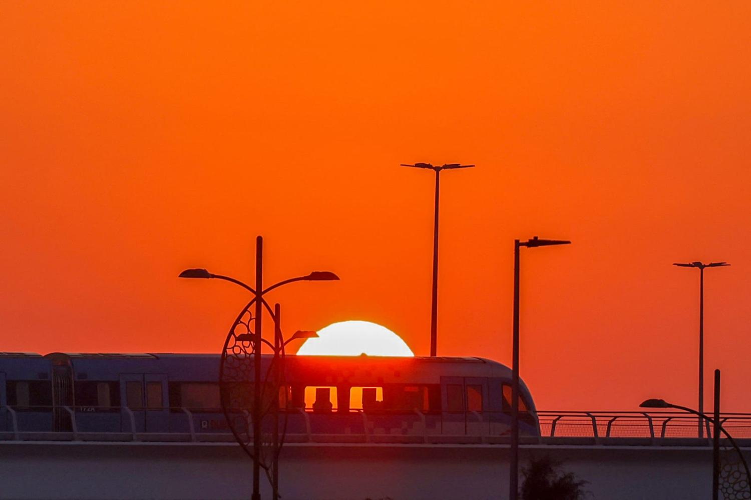 A metro train approaches Expo City station, the venue of the COP28 United Nations climate summit, in Dubai, 6 December (Karim Sahib/AFP via Getty Images)