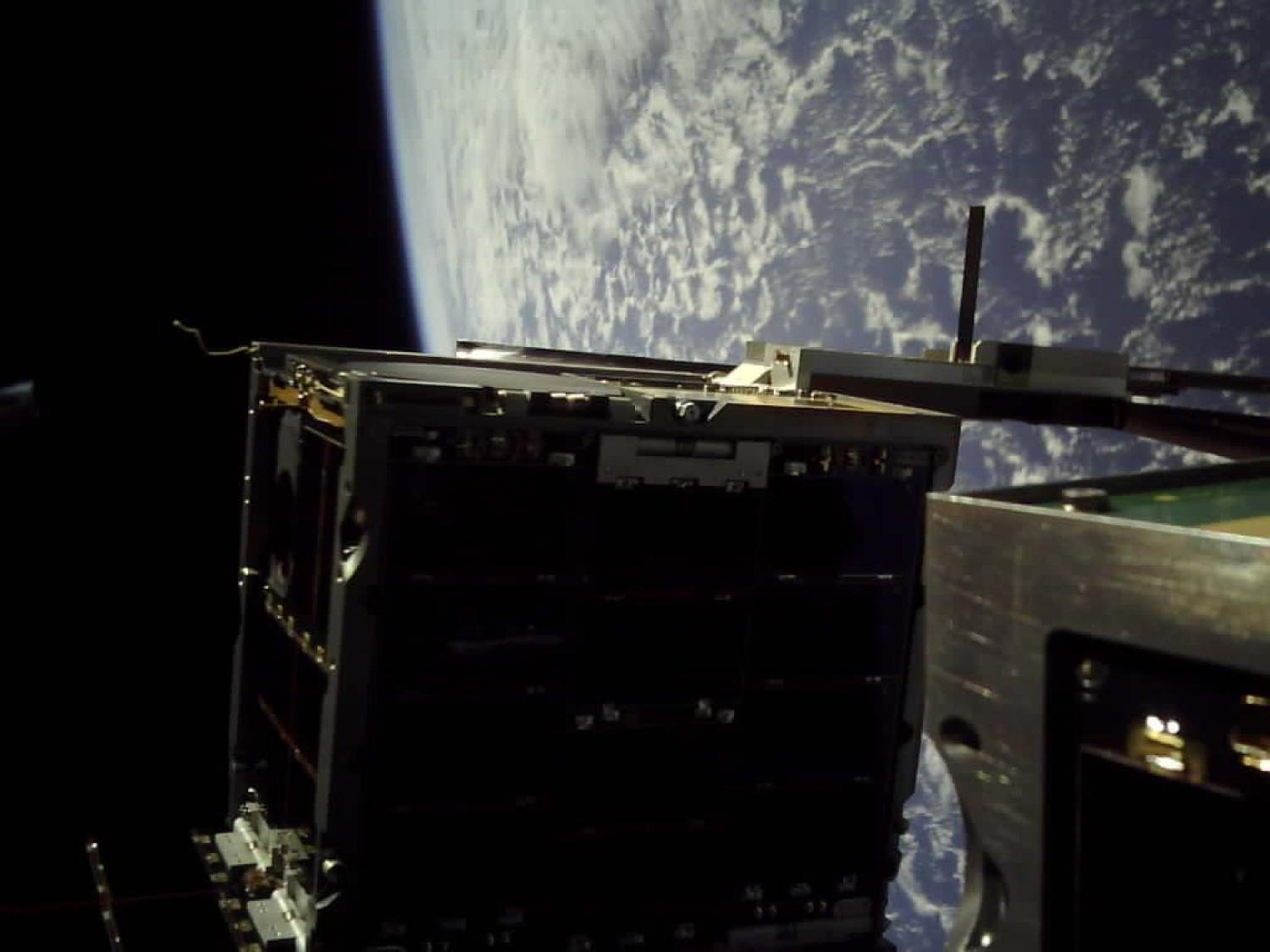 Australia's M2 cube satellite completes a controlled separation in space. (Defence Imagery)