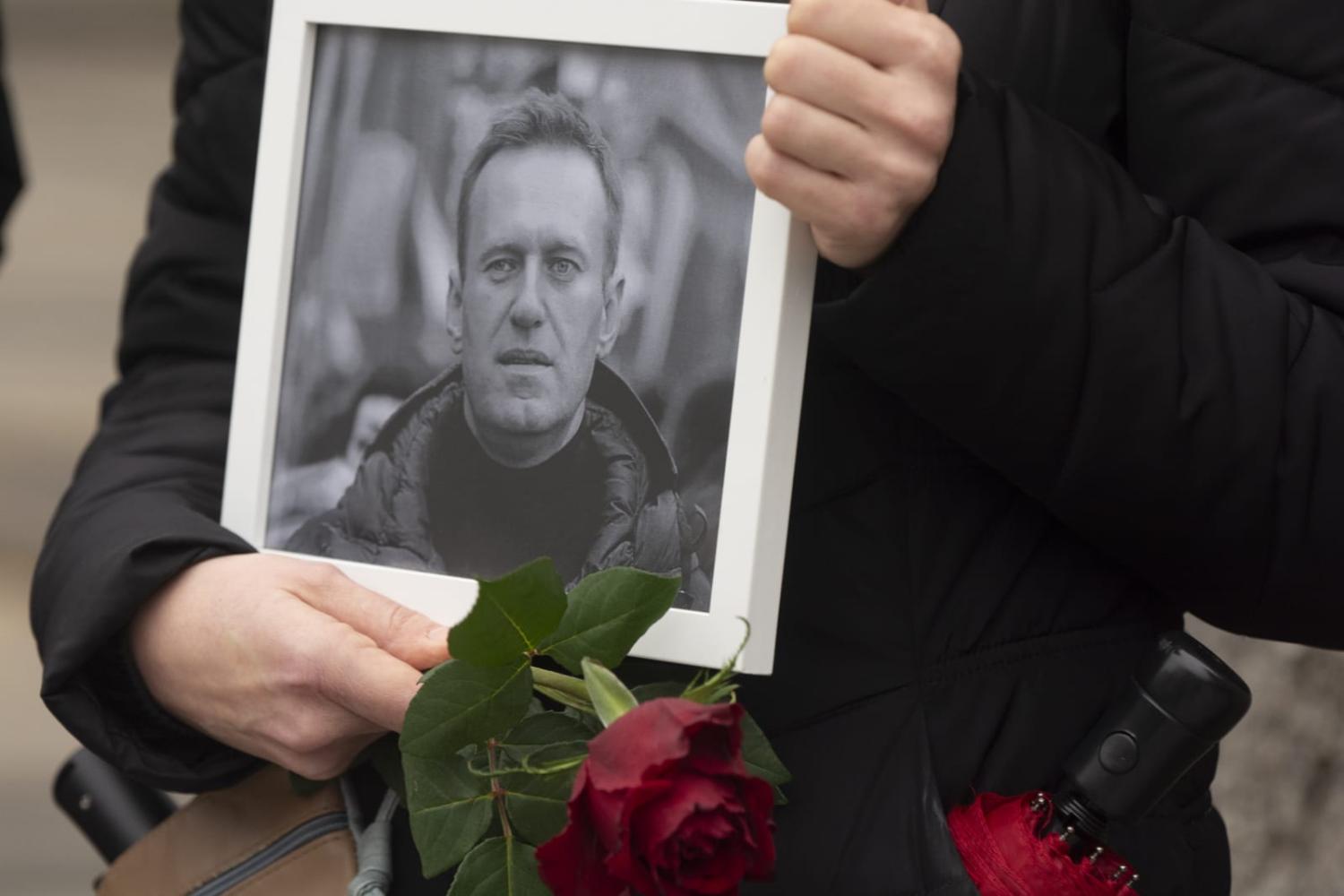 A vigil following the death of Alexei Navalny at Roncalli Square in Cologne, Germany, 18 February 2024 (Ying Tang via Getty Images)