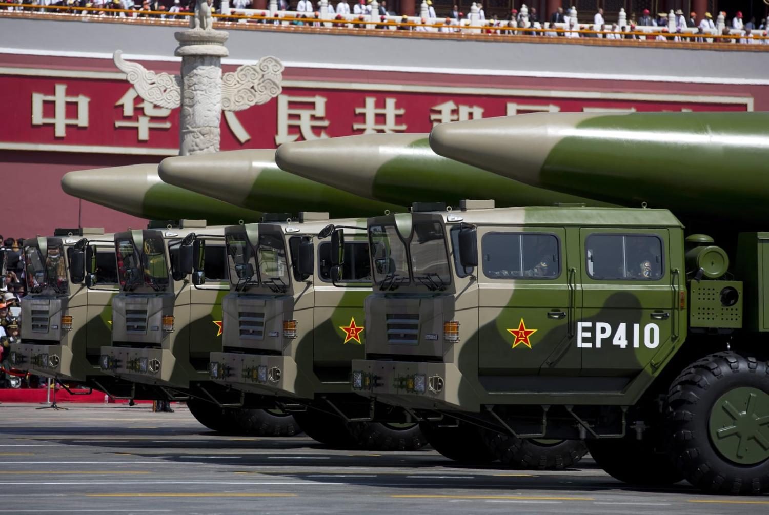 Military vehicles carrying DF-26 ballistic missiles at a 2015 parade in Tiananmen Square, Beijing (Andy Wong via Getty Images)