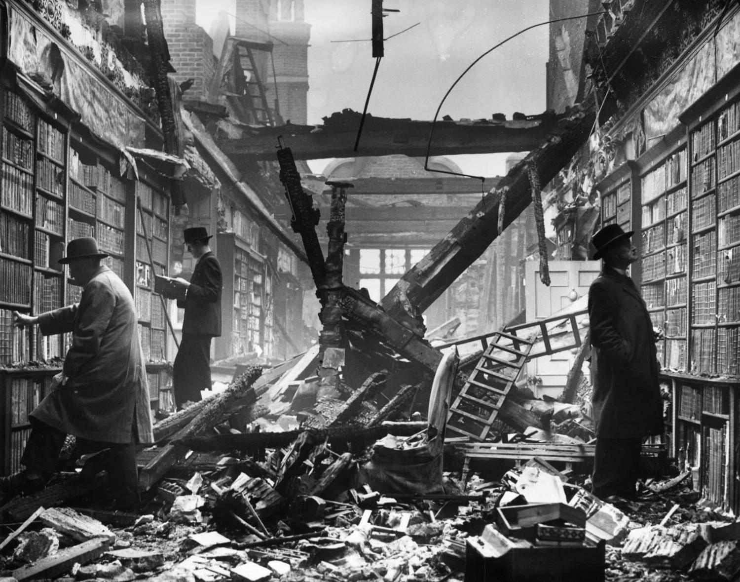 Readers choose books from the charred remains of the Holland House library, London, 23 October 1940 (Harrison/Fox Photos/Hulton Archive/Getty Images)