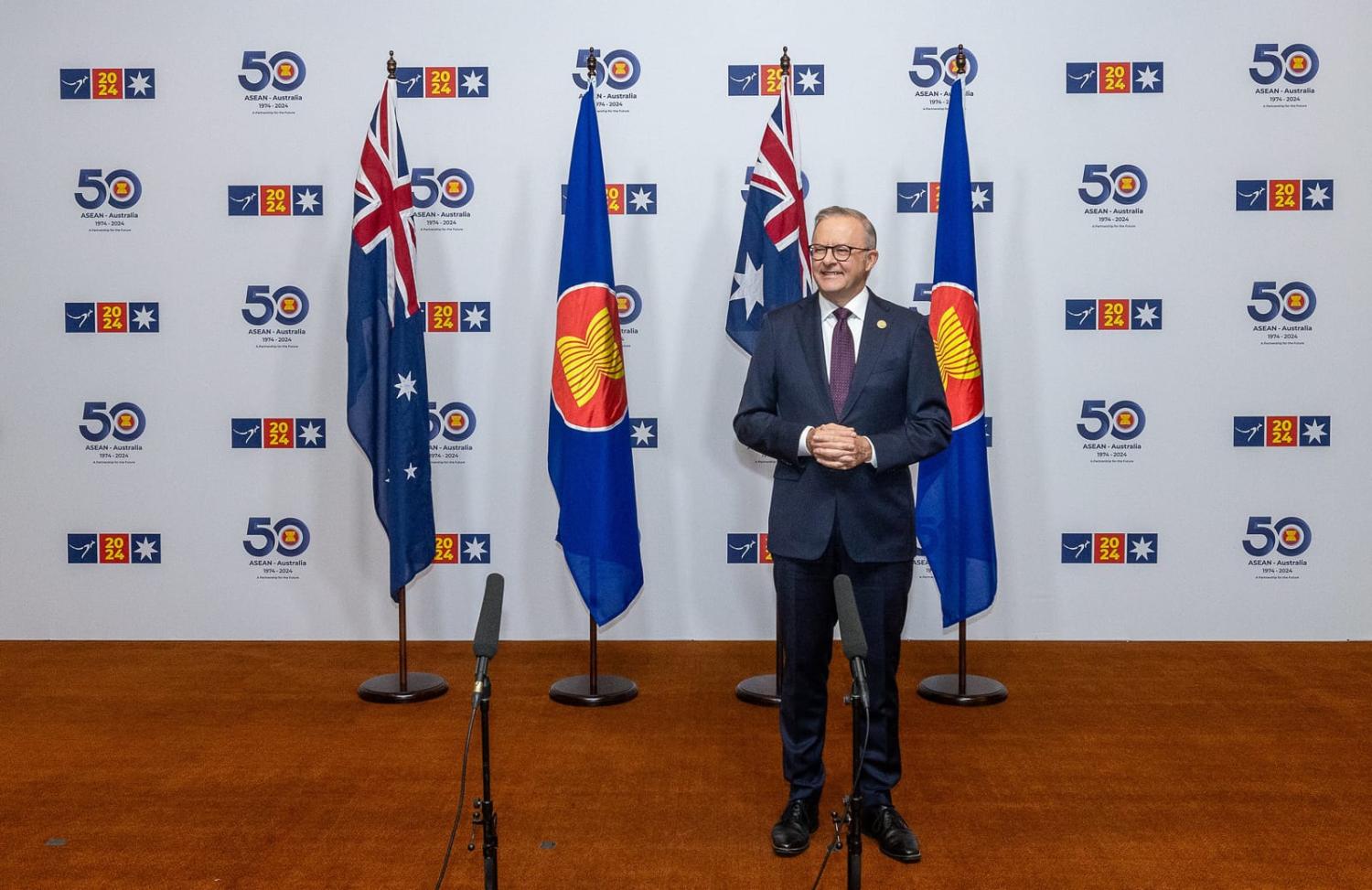 Prime Minister Anthony Albanese waiting to shake hands with ASEAN Secretary General Kao Kim Hourn (Wayne Taylor/ASEAN-Australia Special Summit)