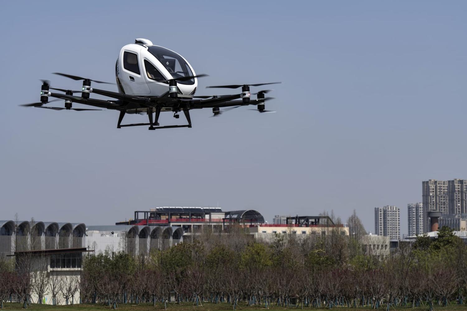 An EH216-S passenger-carrying electric unmanned aerial vehicle in flight last month in Hefei, China (Qilai Shen/Bloomberg via Getty Images)