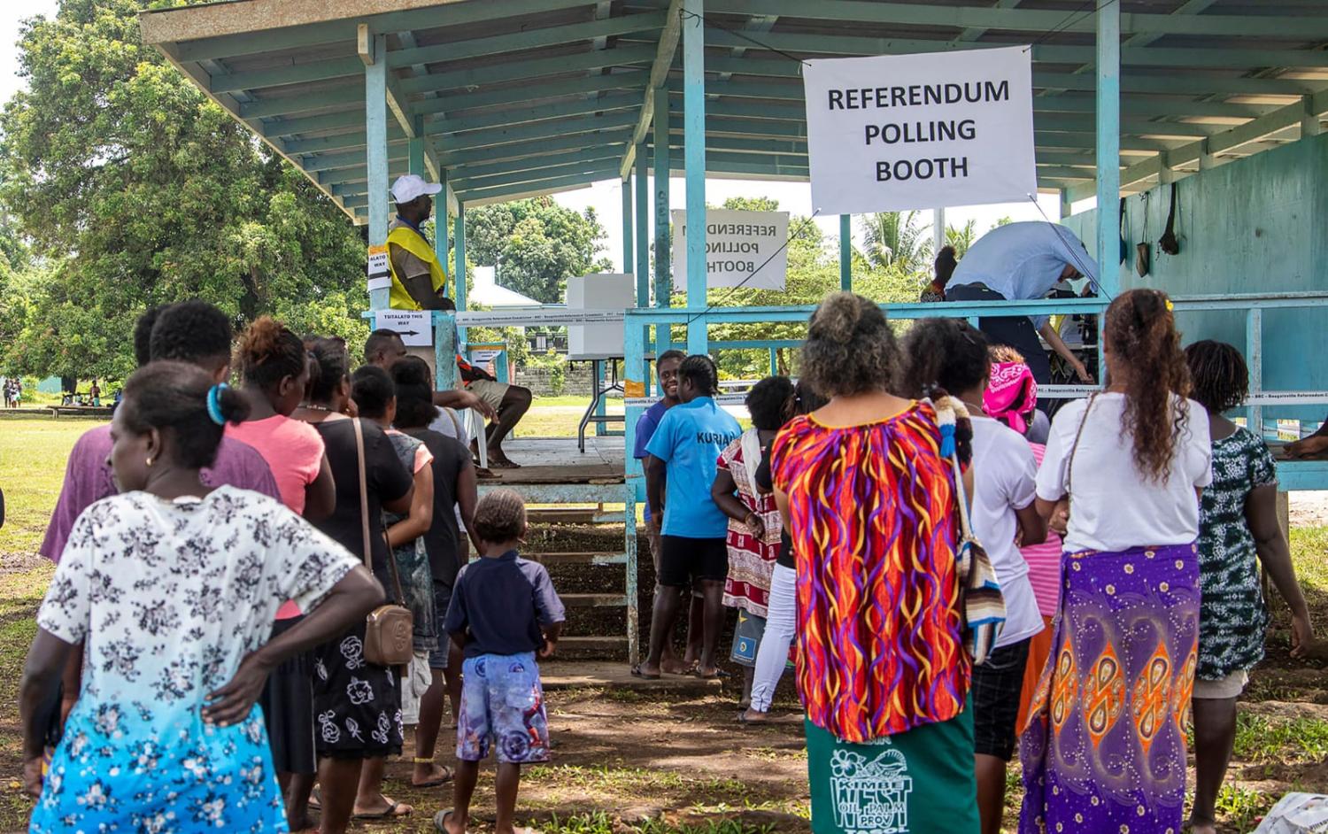 Bougainville residents queue to vote at a polling station during the independence referendum in Buka, 23 November 2019 (Ness Kerton/AFP via Getty Images)