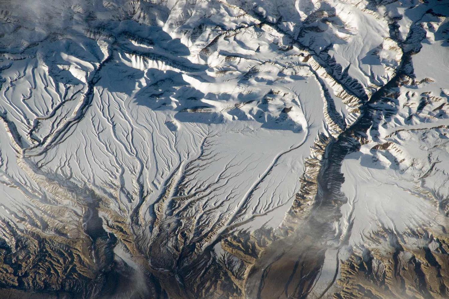 Rivers and snow in the Himalayas along the border between China and India (NASA Johnson/Flickr)