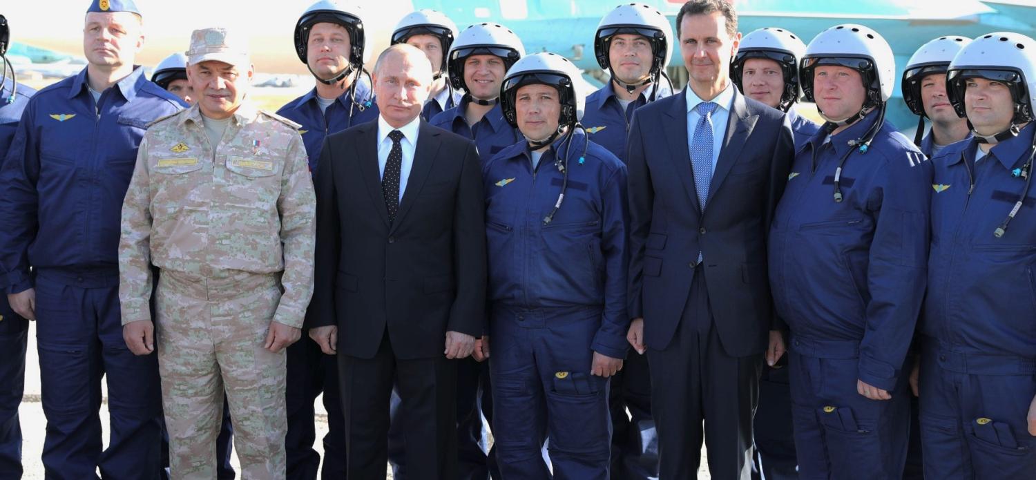 Russian President Vladimir Putin and Syrian President Bashar al-Assad at the Khmeimim air base in Syria, December 2017 (Photo: Kremlin.ru)
