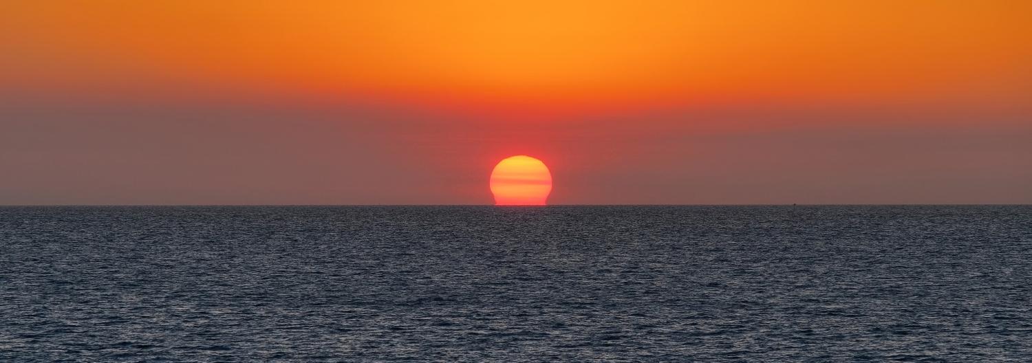 The sun sets over the Timor Sea, as seen from Darwin, August 2017 (Photo: Flickr/Geoff Whalan)