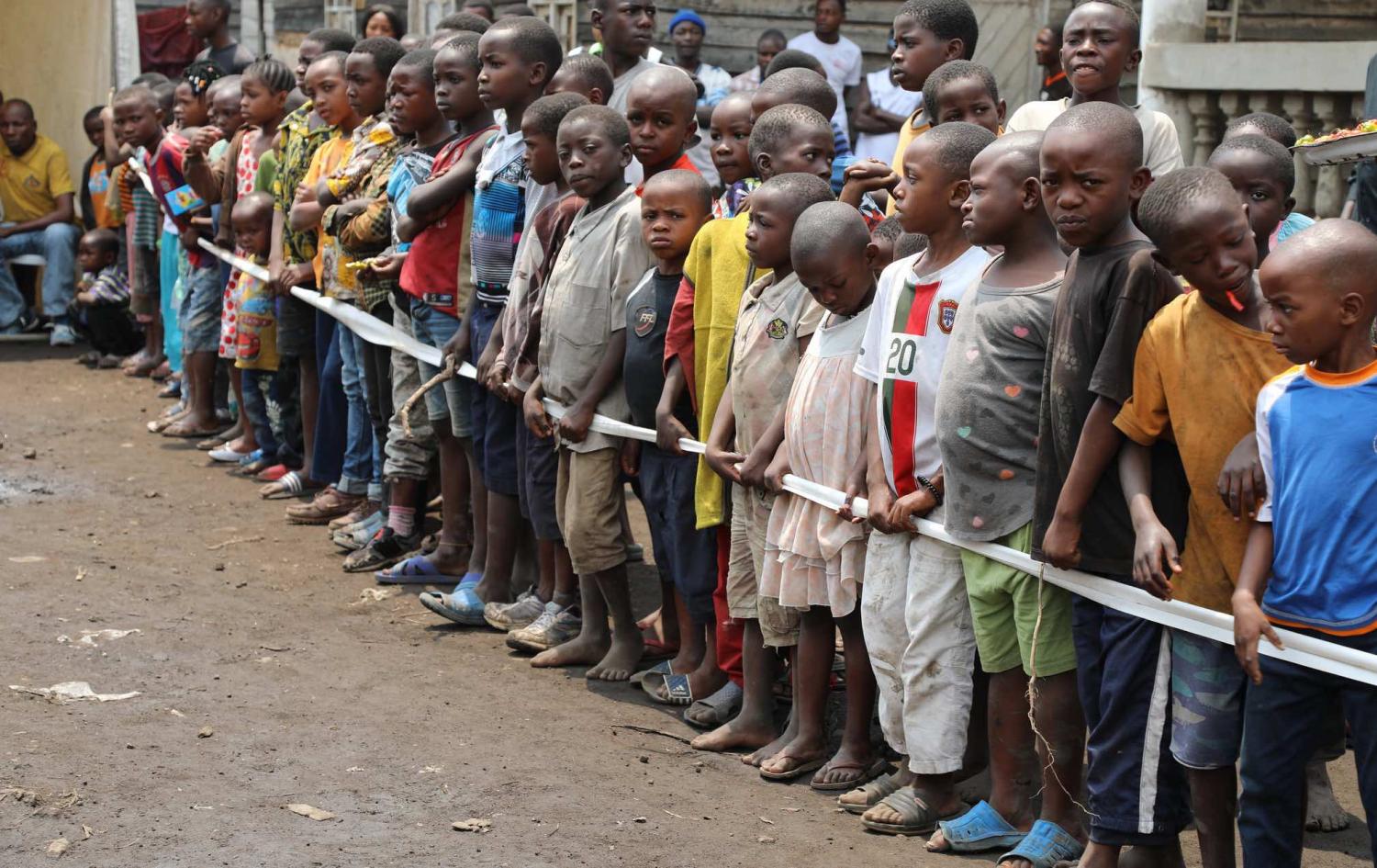Children lined up for community awareness program with UN peacekeepers in Congo (Photo: MONACO Photos/Flickr)