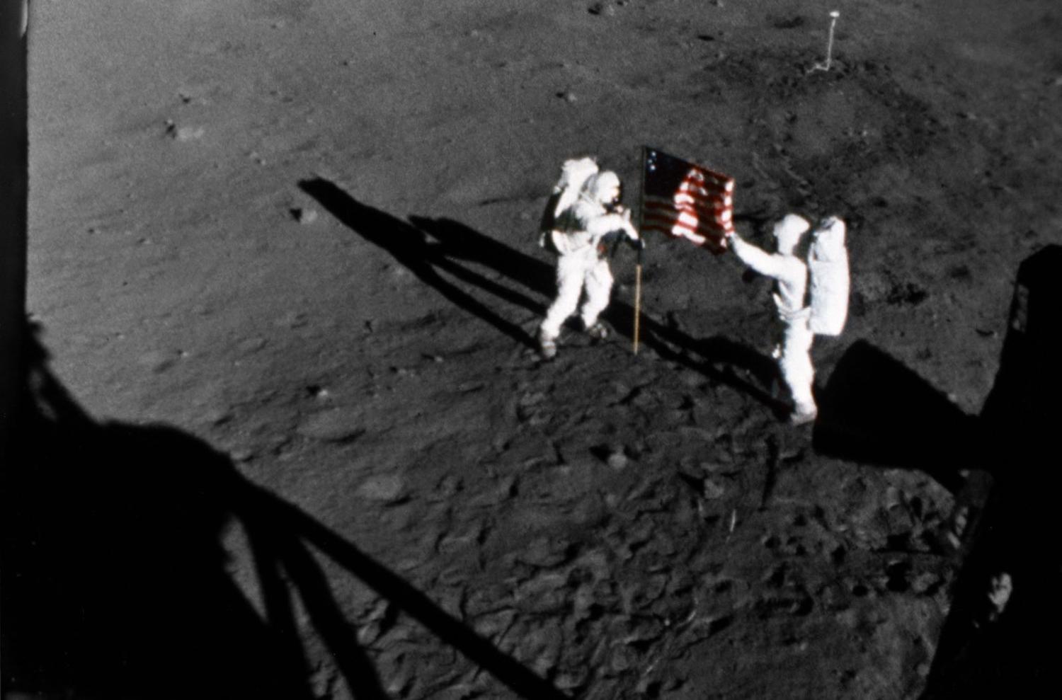 Neil Armstrong (left) and Buzz Aldrin unfurl the US flag on the surface of the Moon (Photo: NASA Johnson/Flickr)