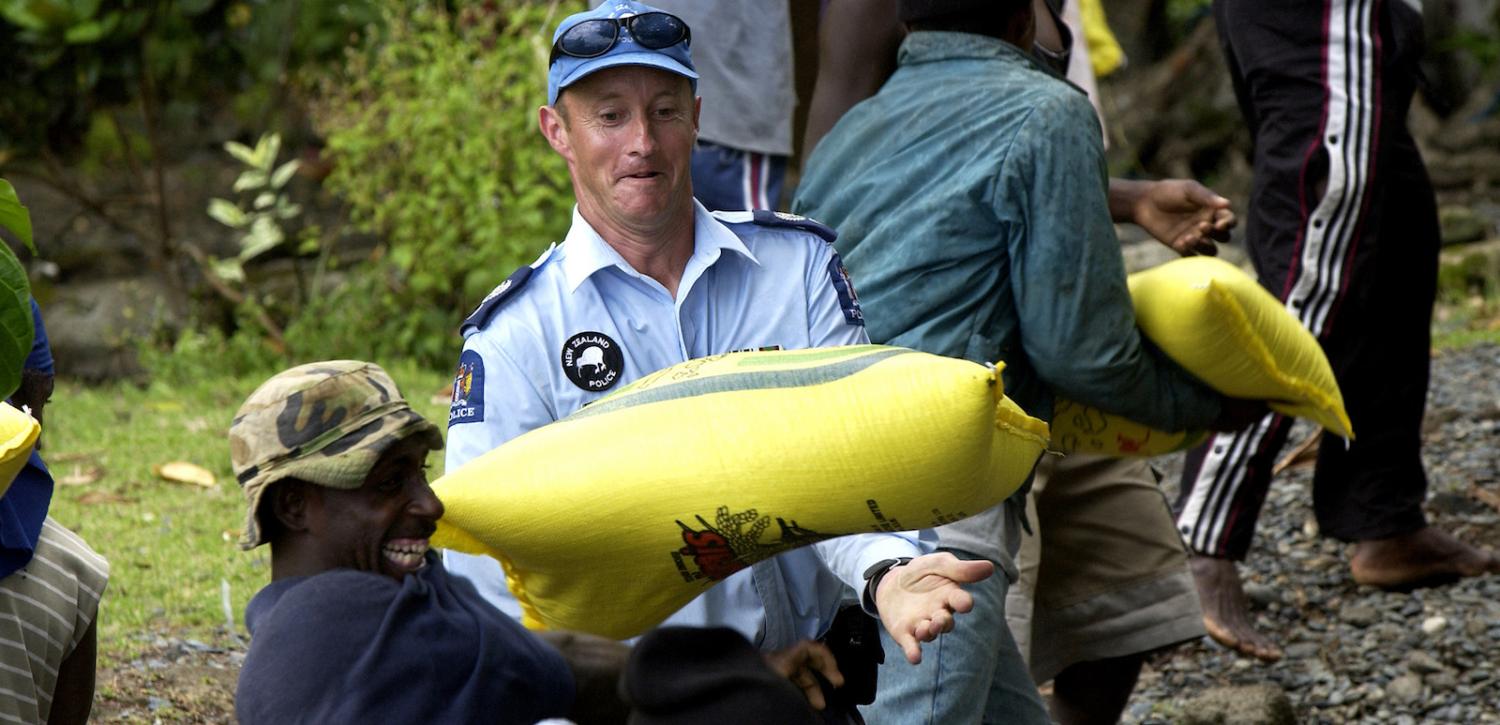 New Zealand police assisting with delivery of AusAID supplies, Solomon Islands, 2003 (Photo: Gary Ramage, Australian Defence/Flickr)