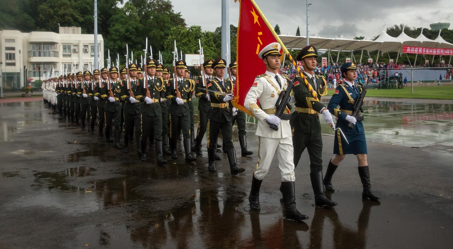 Members of the People's Liberation Army at an open day at the Ngong Suen Chau Barracks in Hong Kong, China, on 8 July. (Photo: Billy Kwok/Getty)