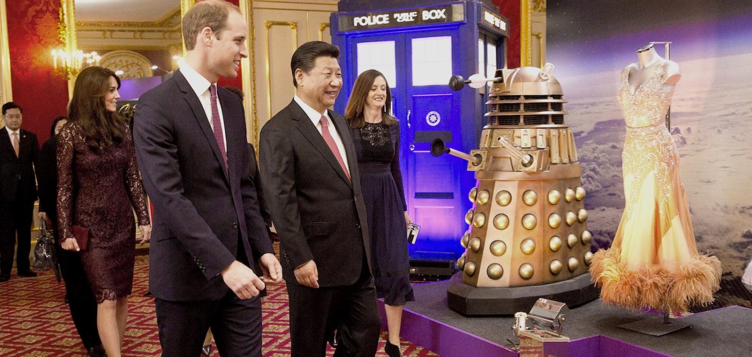 Catherine, Duchess of Cambridge, Prince William, and Chinese President Xi Jinping, walk past a Doctor Who display (Photo: Heathcliff O'Malley/Getty)
